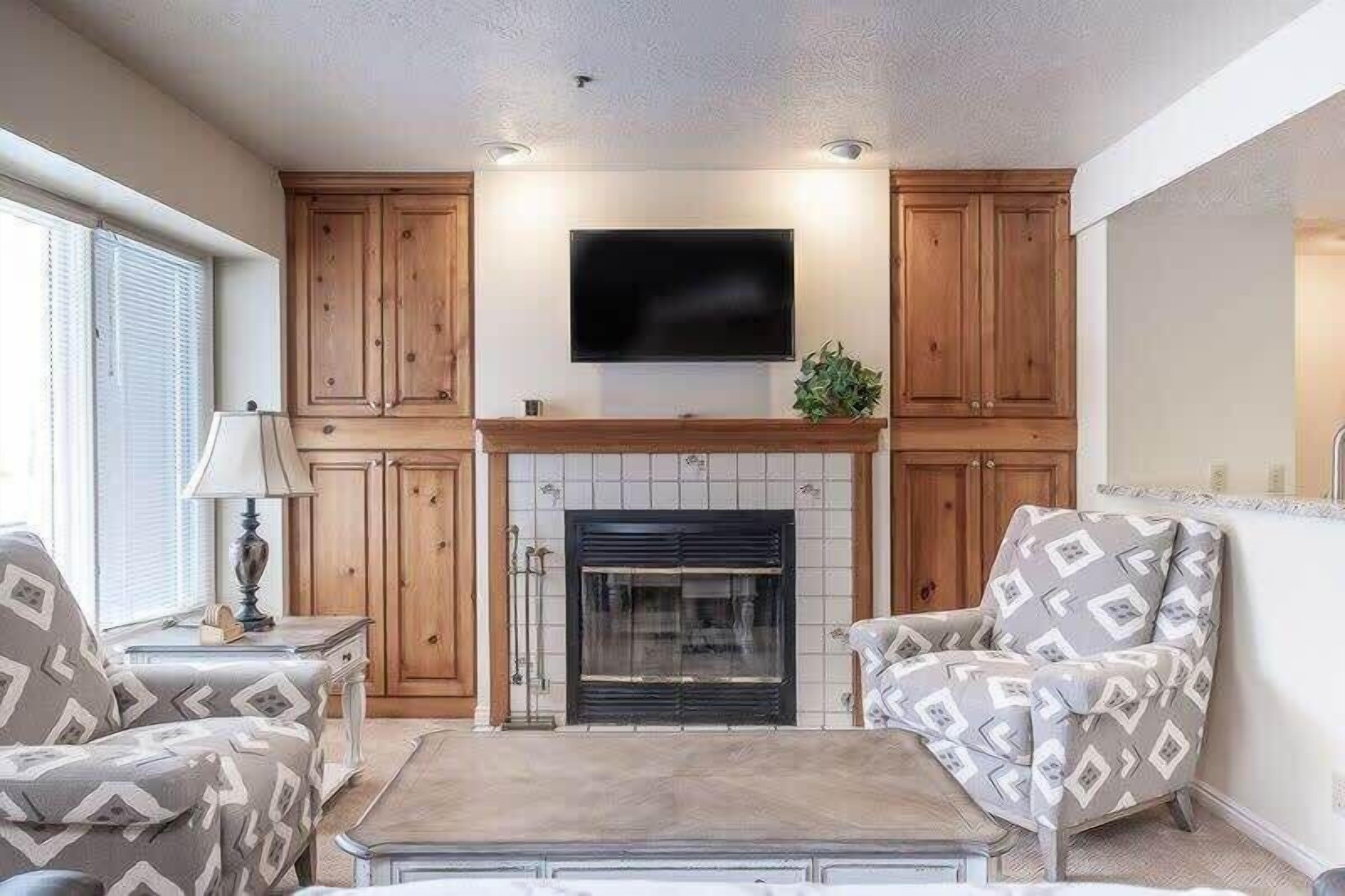 Flat-screen TV, fireplace, offices
