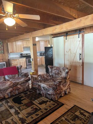 TV, fireplace, books - Lakeside Getaway on Upper Coldstream Pond (Lincoln)