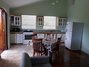Fridge, microwave, oven, stovetop - Ixora Garden Apartments (Friendship Bequia)