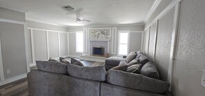 Smart TV, fireplace, ping pong, books