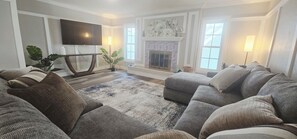 Smart TV, fireplace, table tennis, books