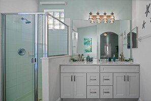 Bathtub, jetted tub, hair dryer, towels