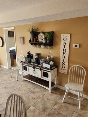 Enjoy a warm beverage at Our Gathering Place, where a well-equipped coffee bar invites relaxation.