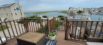 BEAUTIFUL WATER AND SUNSET VIEWS
WITH 2 DECKS AND DOCK
WATERFRONT PROPERTY!