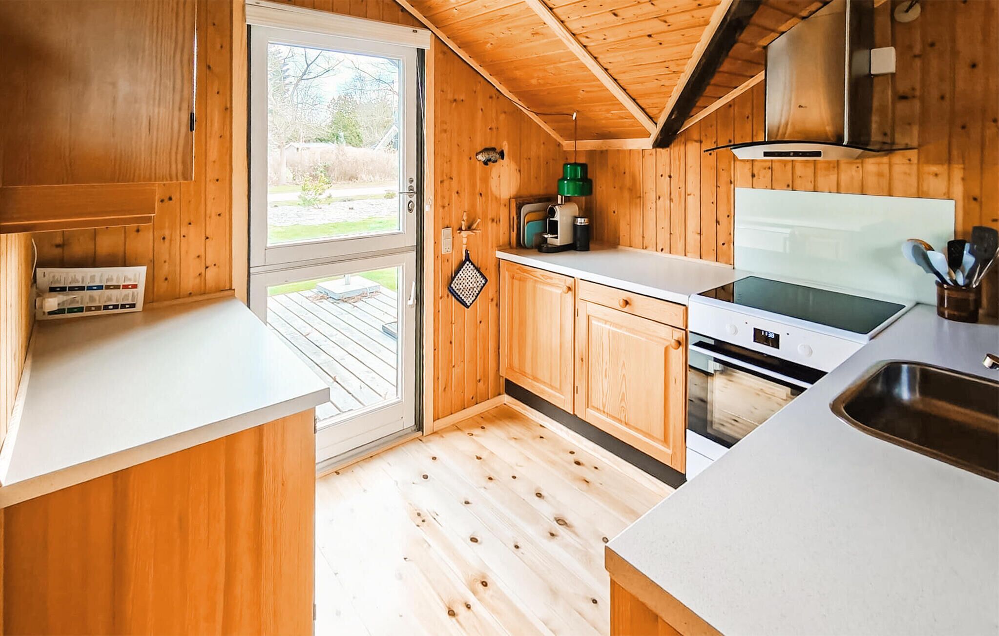 Fridge, stovetop, dishwasher, coffee/tea maker