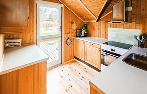 Fridge, stovetop, dishwasher, coffee/tea maker