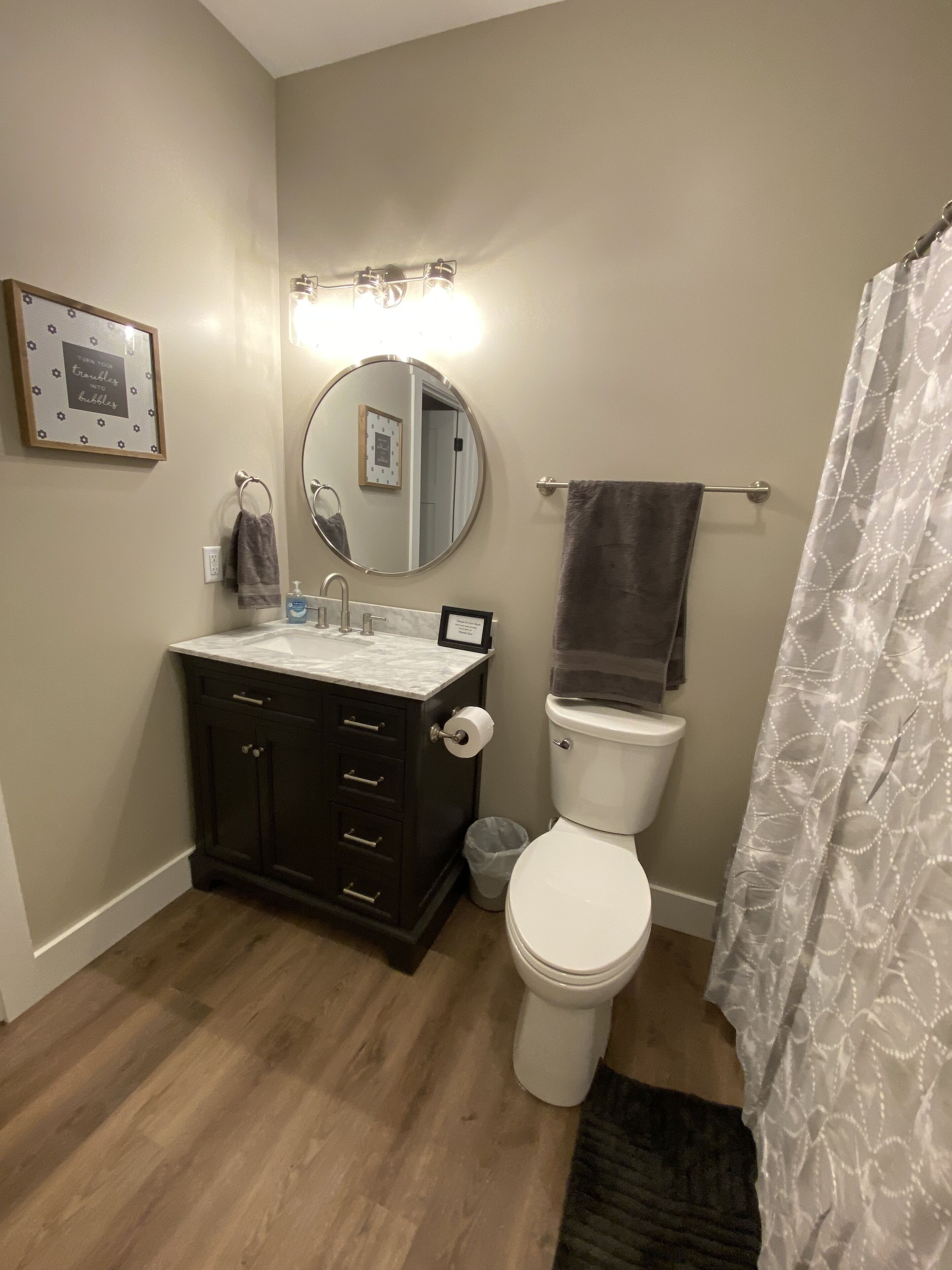 Combined shower/tub, hair dryer, towels, soap