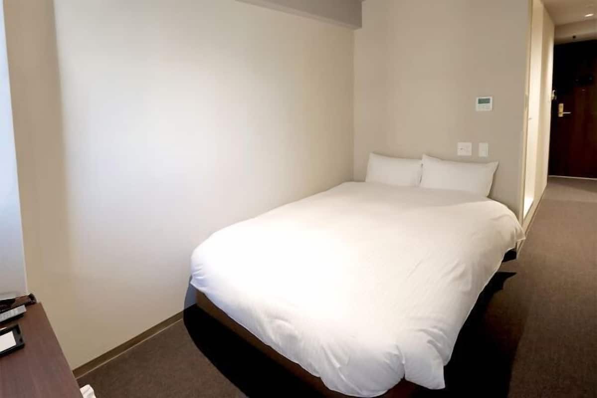 Down comforters, desk, blackout drapes, soundproofing