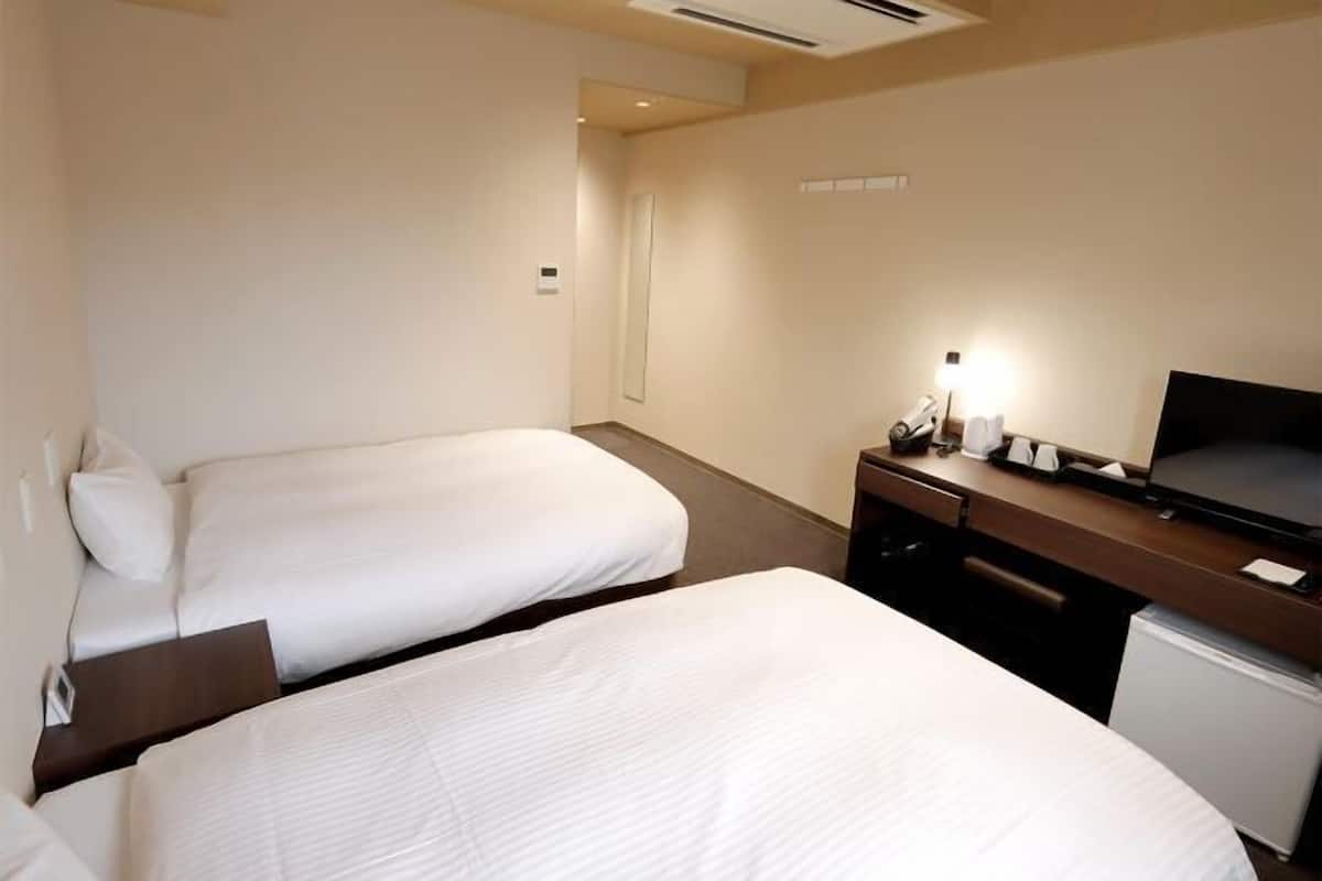 Down comforters, desk, blackout drapes, soundproofing