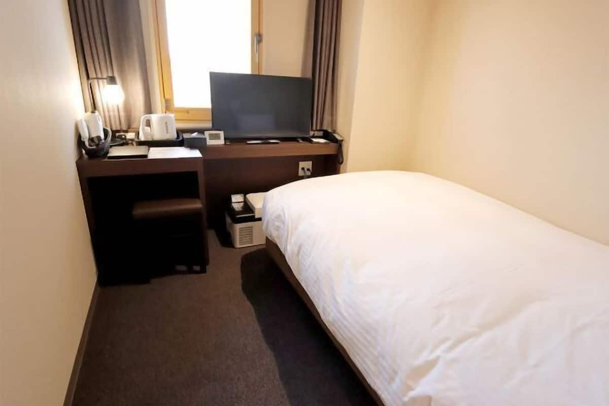 Down comforters, desk, blackout drapes, soundproofing