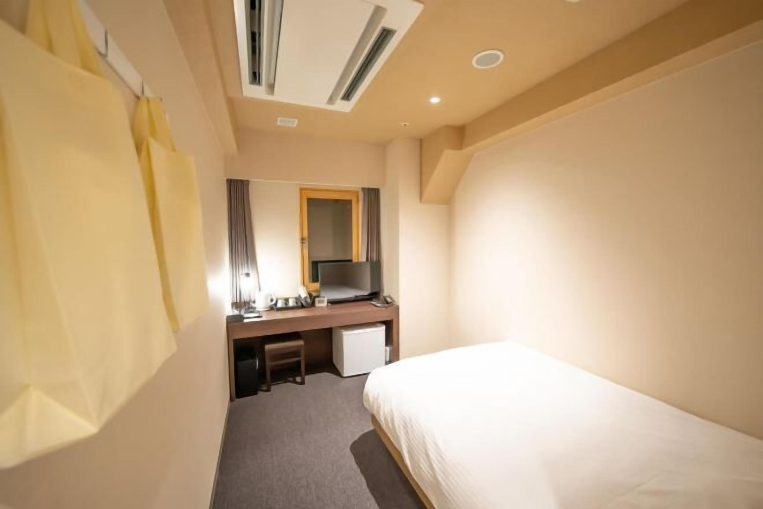 Down comforters, desk, blackout drapes, soundproofing