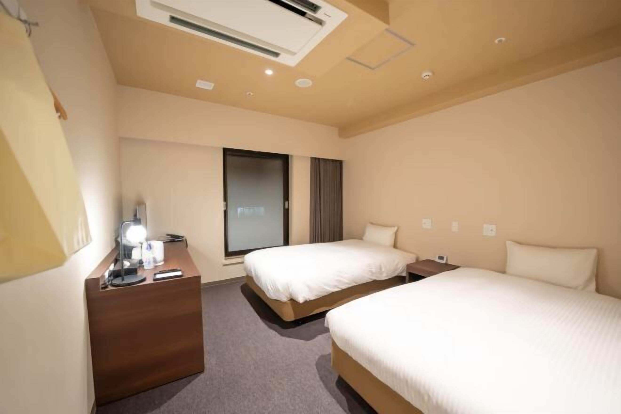 Down comforters, desk, blackout drapes, soundproofing