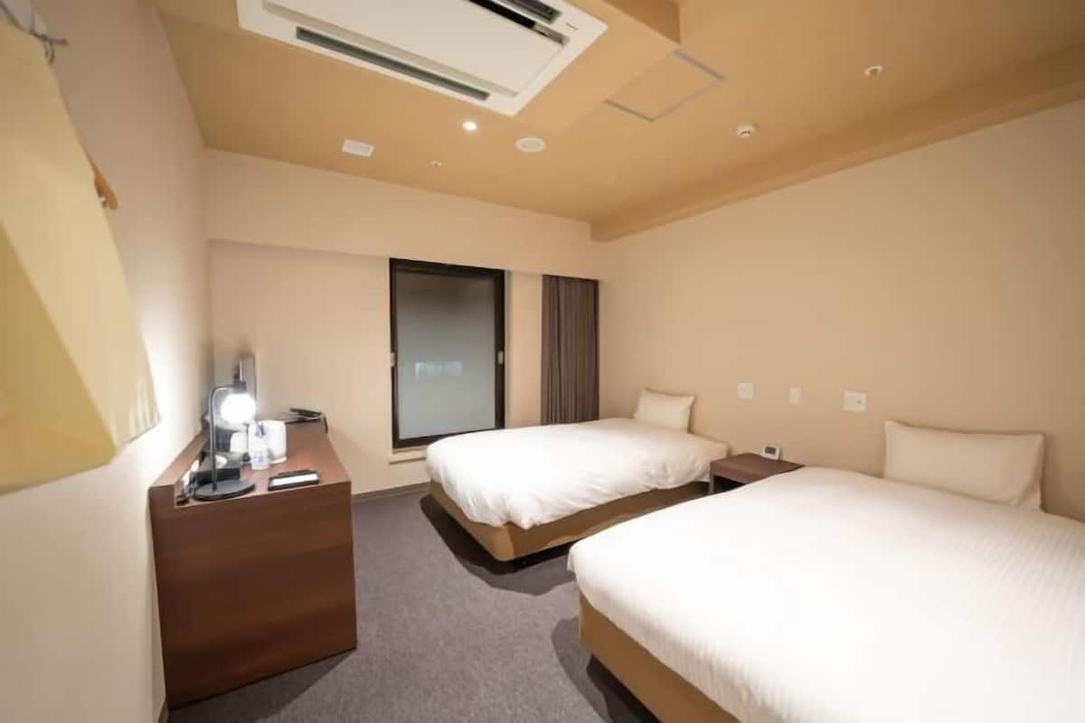 Down comforters, desk, blackout drapes, soundproofing