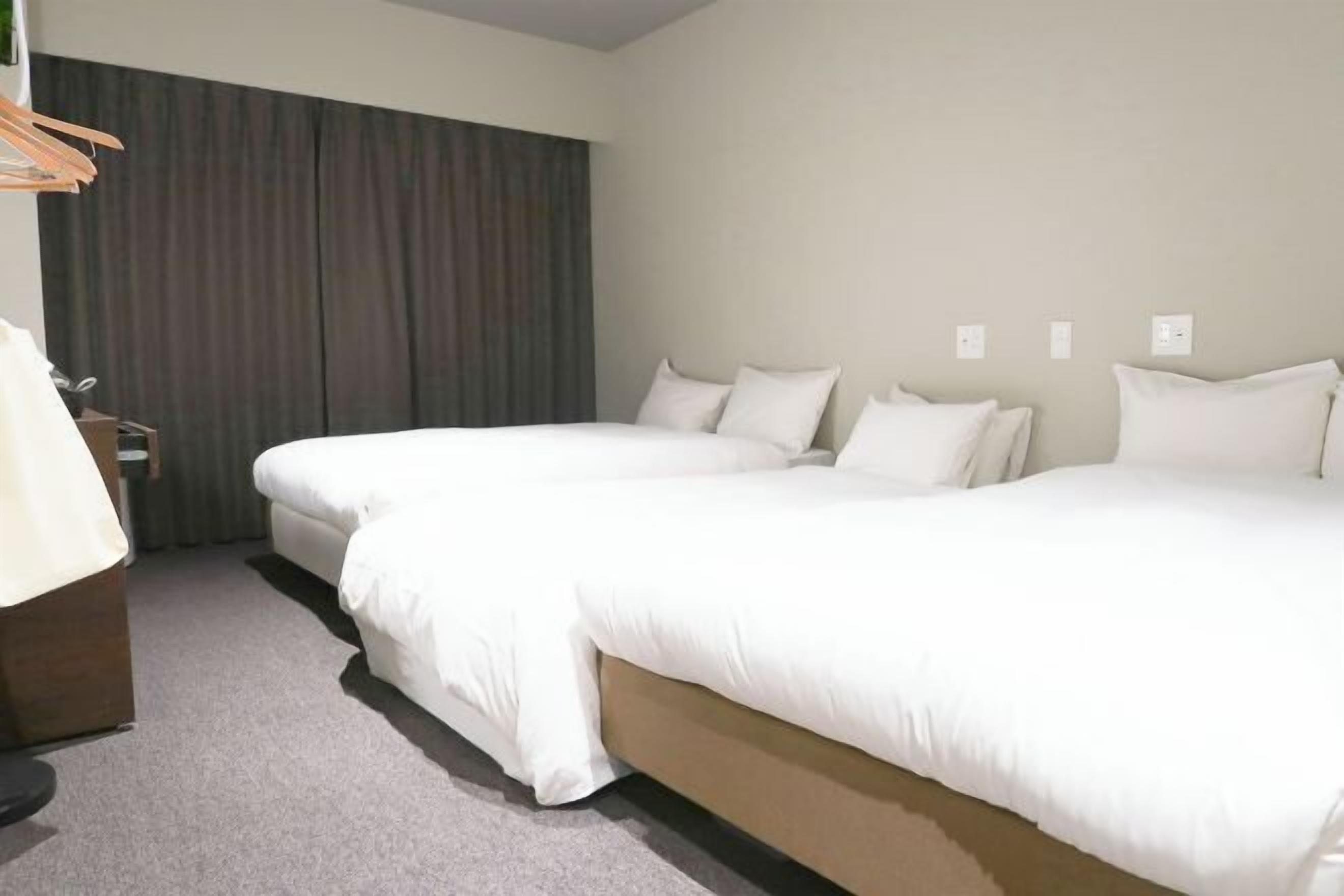 Down comforters, desk, blackout drapes, soundproofing