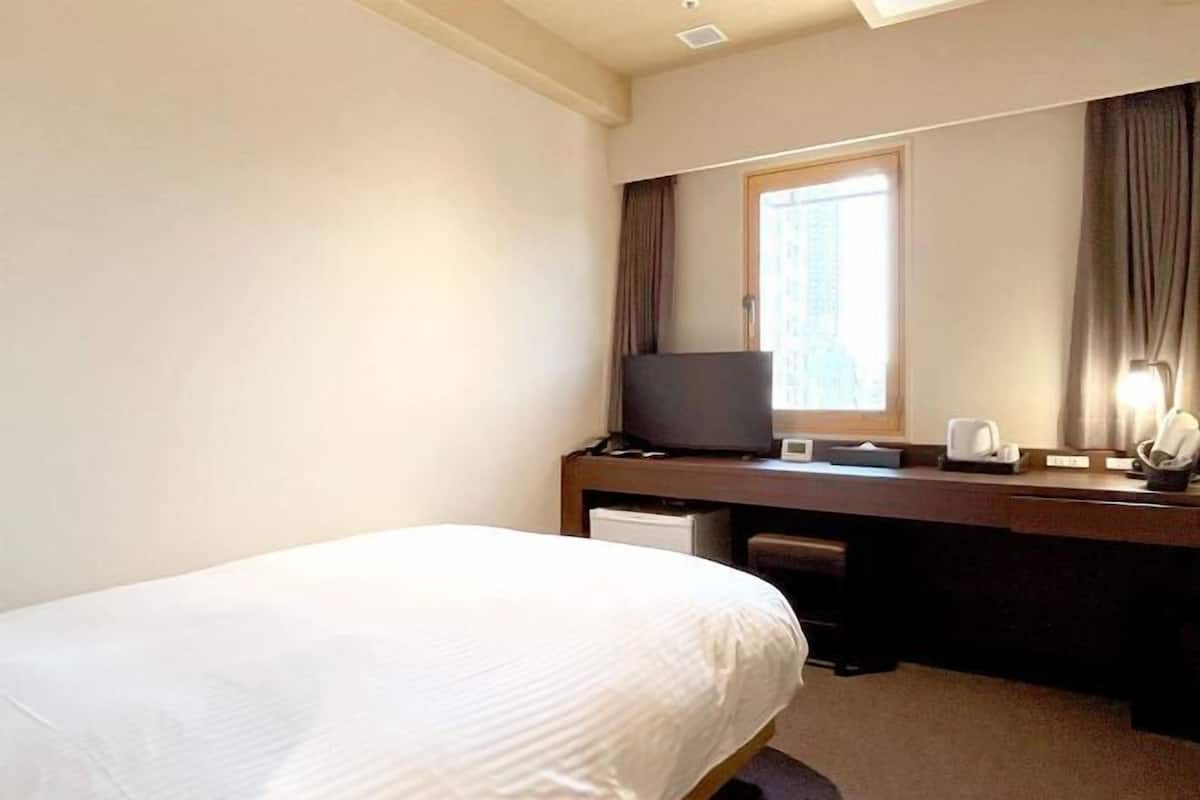 Down comforters, desk, blackout drapes, soundproofing