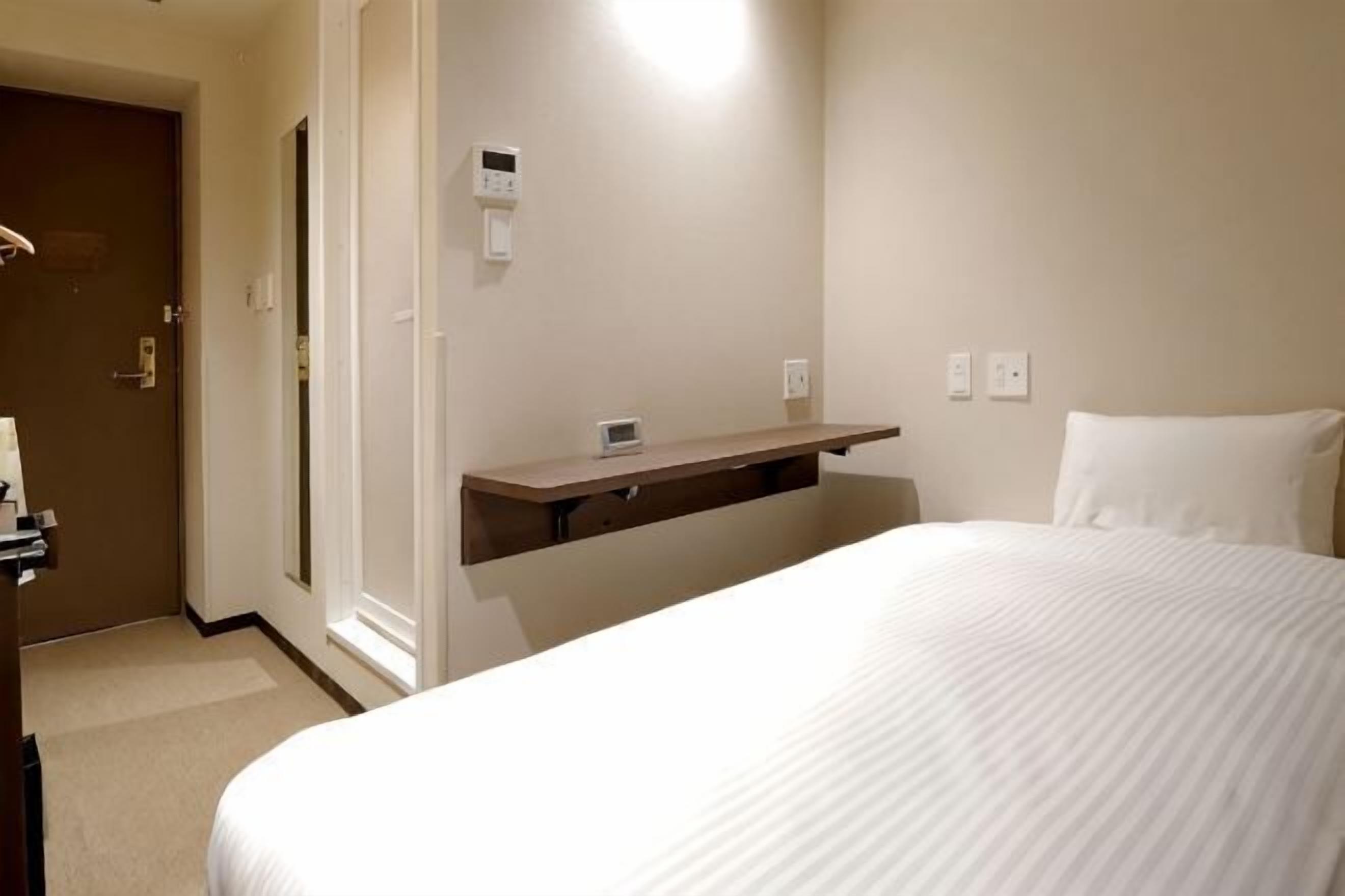 Down comforters, desk, blackout drapes, soundproofing