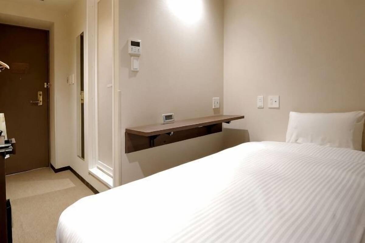 Down comforters, desk, blackout drapes, soundproofing