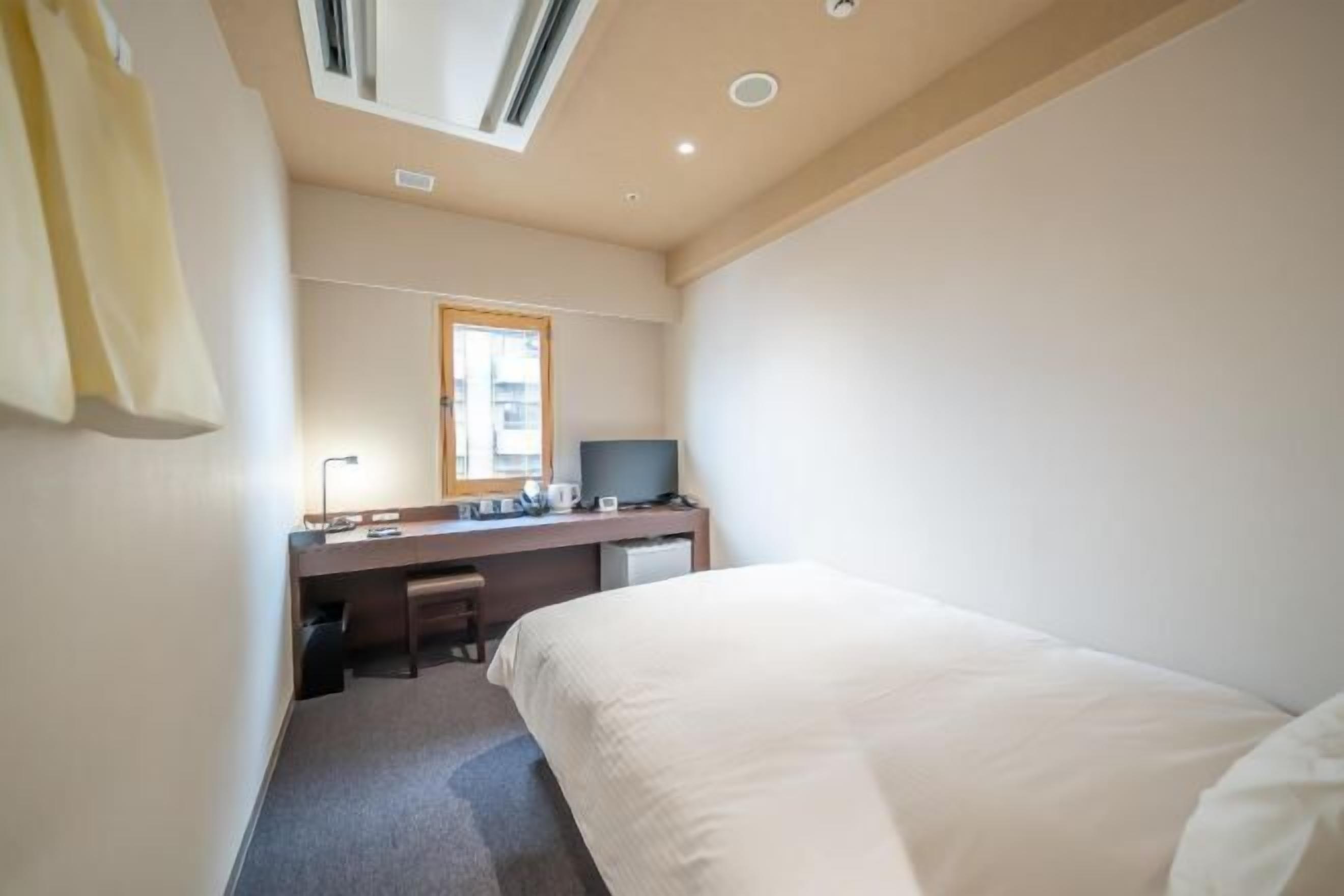 Down comforters, desk, blackout drapes, soundproofing