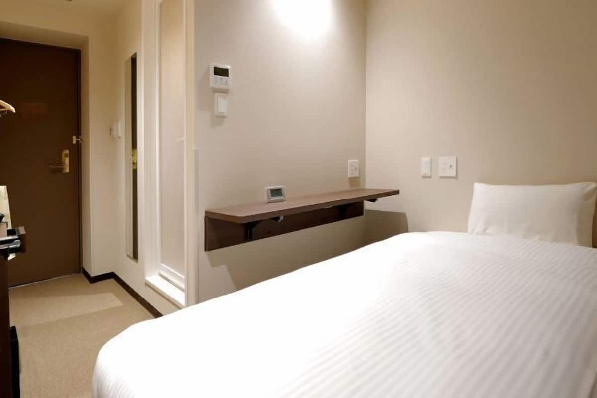 Down comforters, desk, blackout drapes, soundproofing