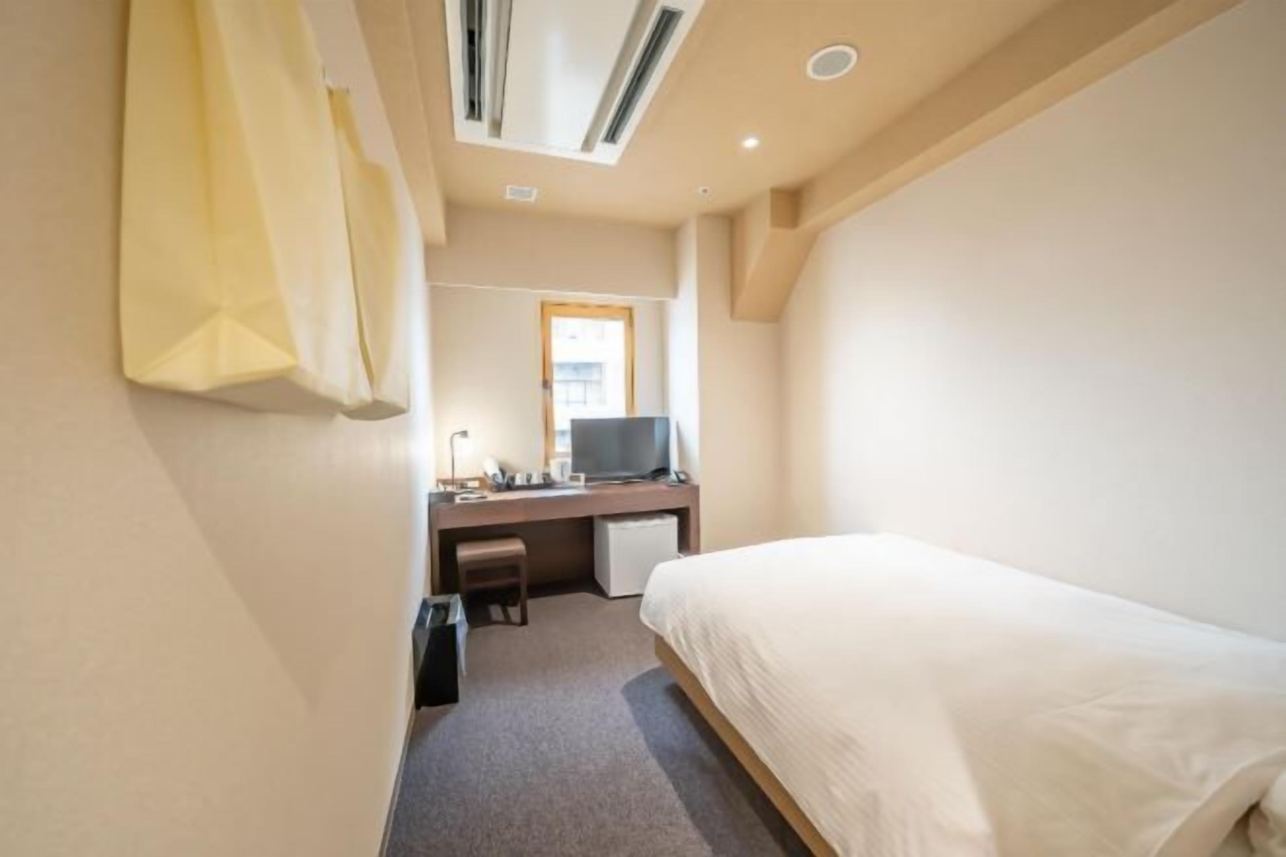 Down comforters, desk, blackout drapes, soundproofing