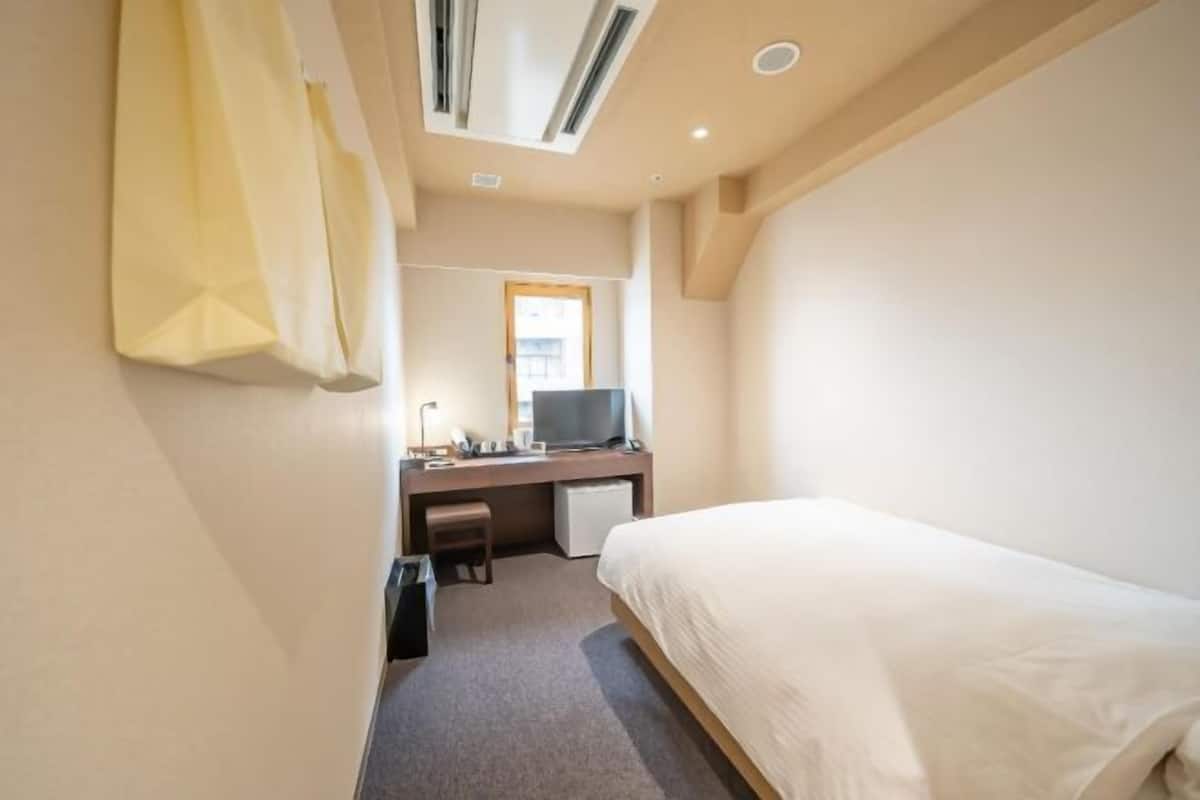 Down comforters, desk, blackout drapes, soundproofing