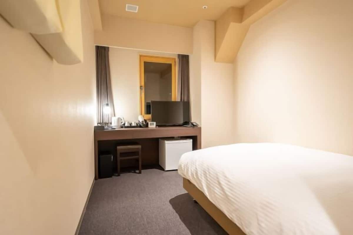 Down comforters, desk, blackout drapes, soundproofing