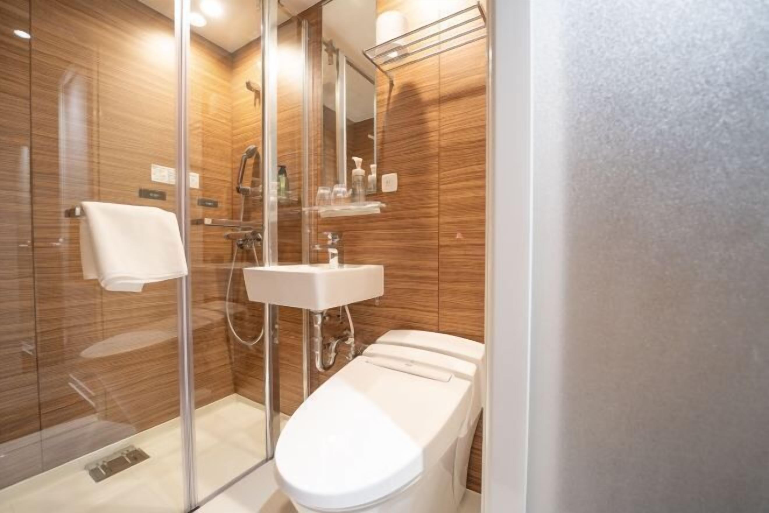 Shower, free toiletries, hair dryer, slippers