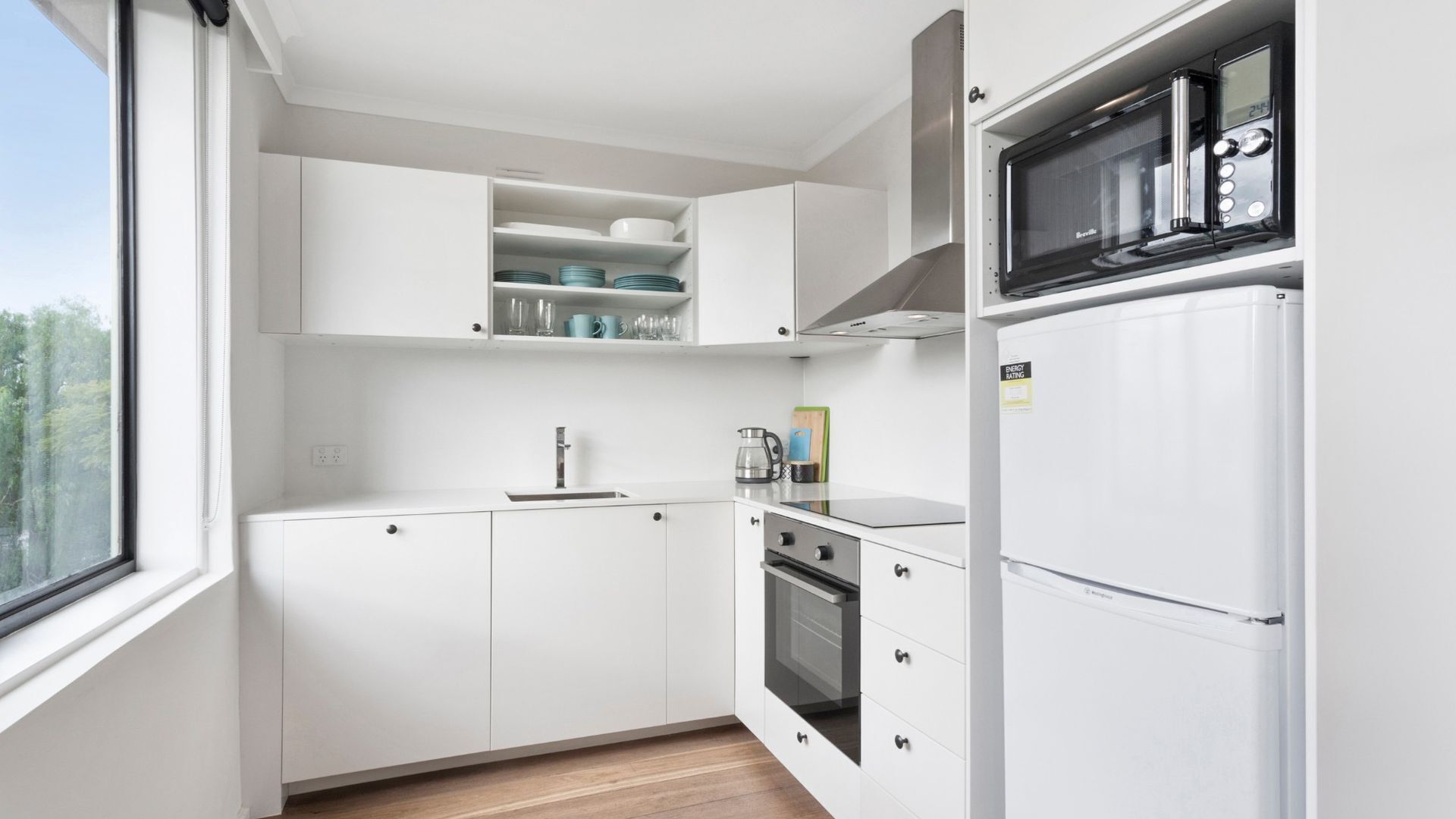Coffee/tea maker, fridge, microwave, oven