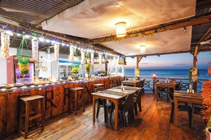 Breakfast, lunch, dinner served; international cuisine, beach views 