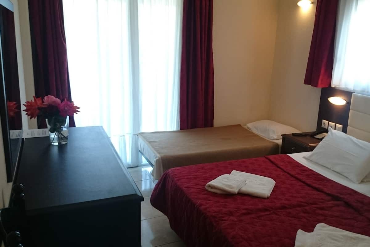 Basic Twin Room, Partial Sea View | In-room safe, travel crib