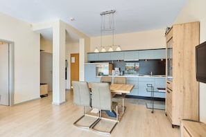 Appartement Standard | Cuisine privée | Réfrigérateur, plaque de cuisson, grille-pain