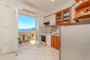Apartment, 2 Bedrooms, Smoking, Balcony | Private kitchen | Microwave, coffee/tea maker, electric kettle, dining tables - Apartment for 4 Persons, by the sea and With Beautiful View (Kali)