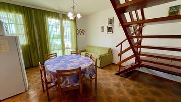 Villa, 3 Bedrooms, Balcony, Pool View | Dining room