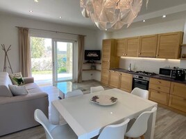 Exclusive Condo, 2 Bedrooms | Living area | 32-inch LCD TV with satellite channels, TV, toys