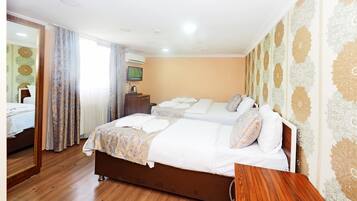 Standard Triple Room | Premium bedding, minibar, desk, blackout drapes