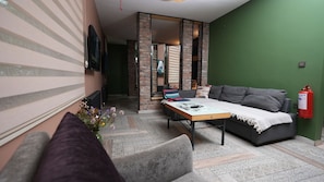 Royal-Suite | Wohnbereich | 55-Zoll-LCD-Fernseher mit Satellitenempfang, Fernseher