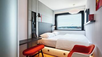 Premium bedding, down duvets, pillow-top beds, in-room safe
