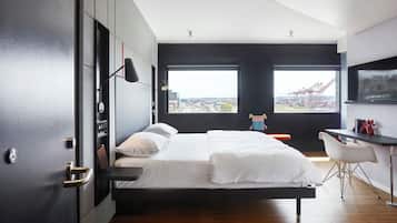 Premium bedding, down comforters, pillowtop beds, in-room safe