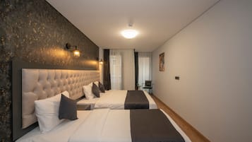 Family Suite, Multiple Beds | 1 bedroom, individually decorated, individually furnished, desk