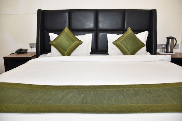 Habitación doble Deluxe | Camas con efecto memoria, wifi gratis y ropa de cama