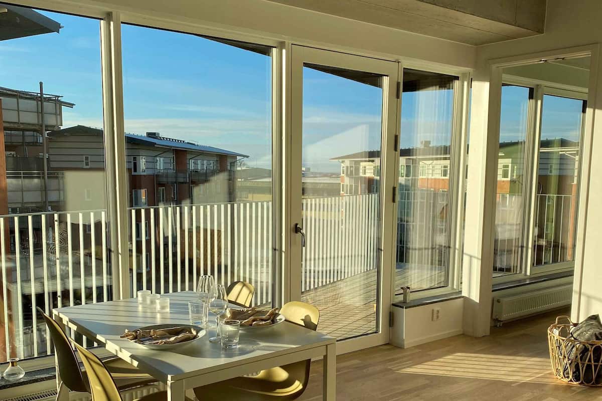 Business Apartment, Balcony | Living area | 43-inch flat-screen TV with cable channels, TV