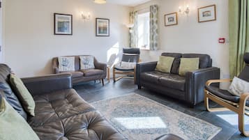 32-inch flat-screen TV with cable channels, TV