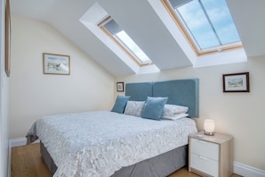 4 bedrooms, premium bedding, iron/ironing board, free WiFi