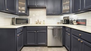 A kitchen with dark cabinets, a microwave, a coffee maker, and a dishwasher. - ★Farmhouse Style★Outdoor Patios★Parking!★Beautiful (Pittsburgh)
