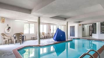 Indoor pool, open 8:00 AM to 10:00 PM, pool loungers