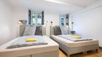 2 habitaciones, tabla de planchar con plancha, wifi y ropa de cama