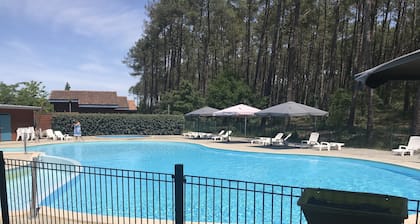 Chalet in a holiday village near the beach