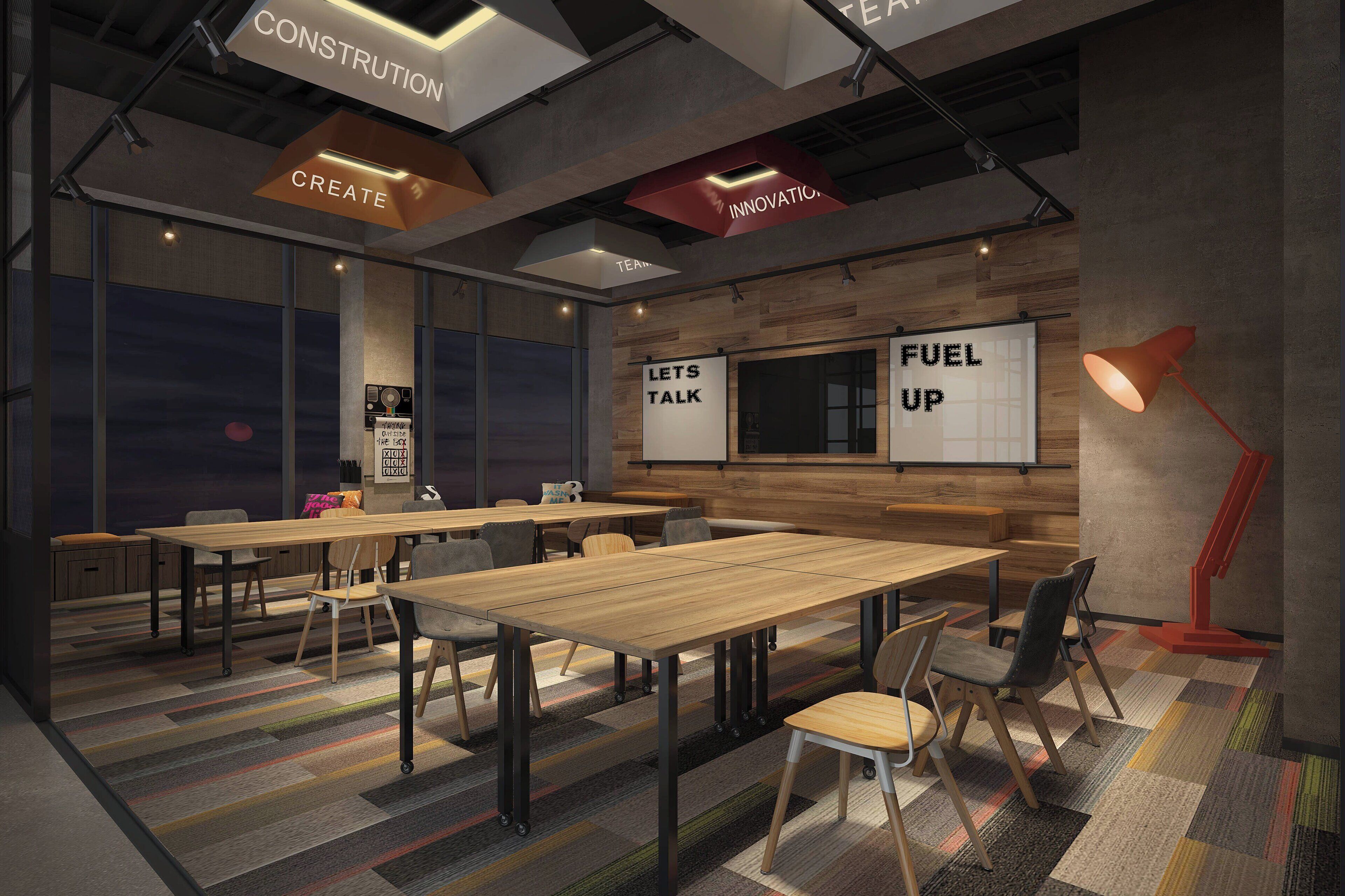 A modern conference room with large tables, chairs, and a 'Let's Talk' banner.