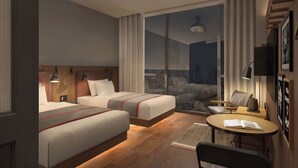 A hotel room with two beds, a small table, a chair, and a view through a glass door. - Moxy Nanjing Jiangning (Nanjing)