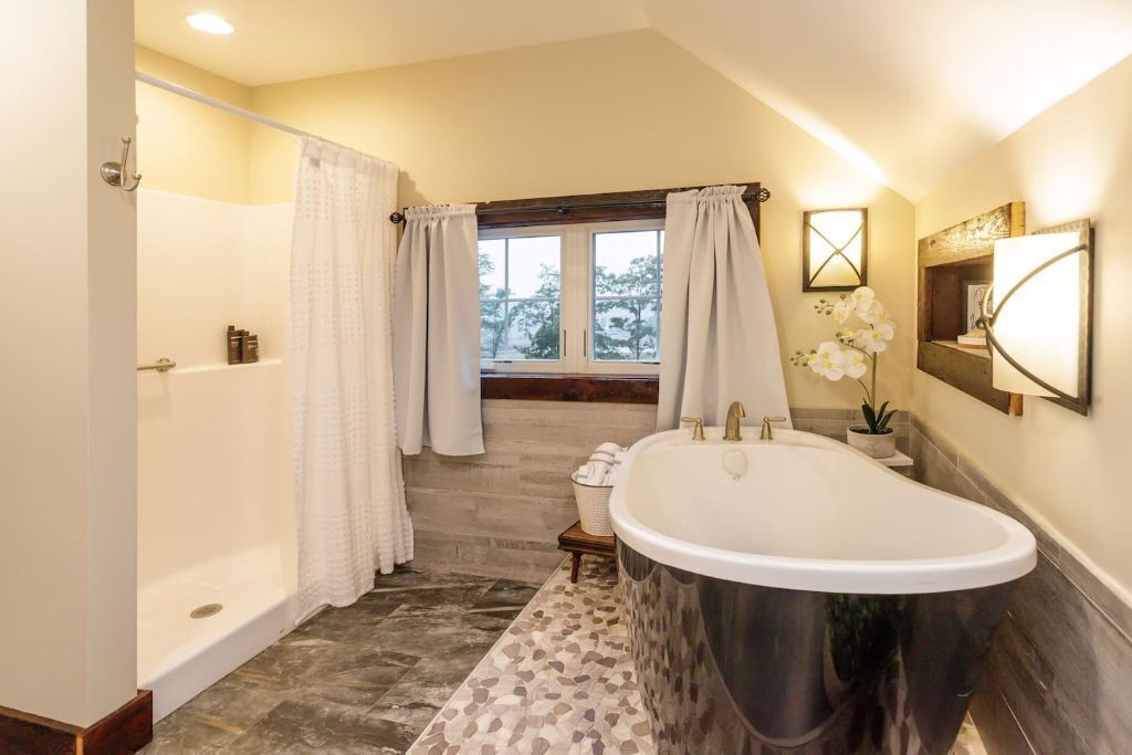 Bathtub, hair dryer, towels, soap